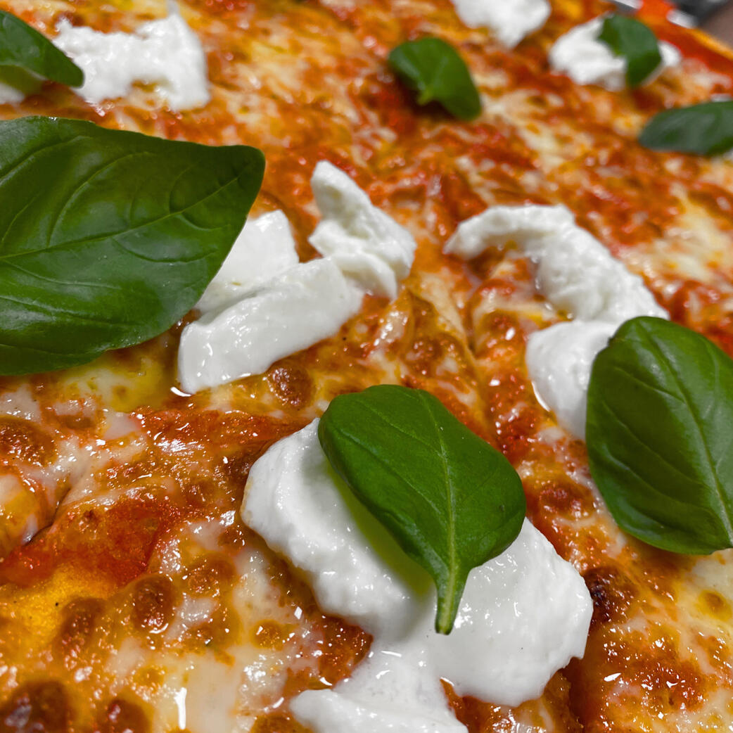 Foto pizza con mozzarella di bufala