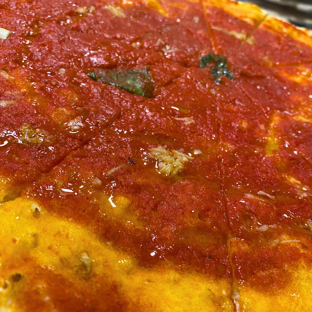 Foto pizza marinara aglio e pomodoro